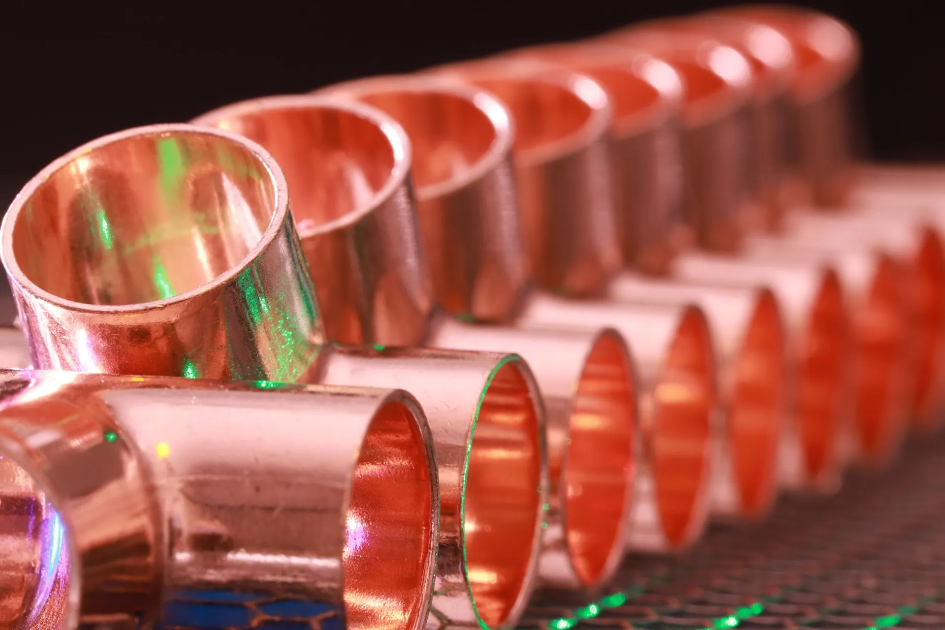 Rows of copper pipe fittings